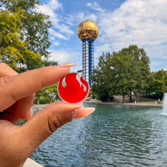 World's Fair Flame Lapel Pin