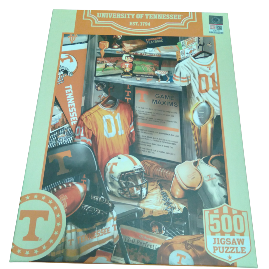 Jigsaw puzzle packaging with football-themed design on a white background