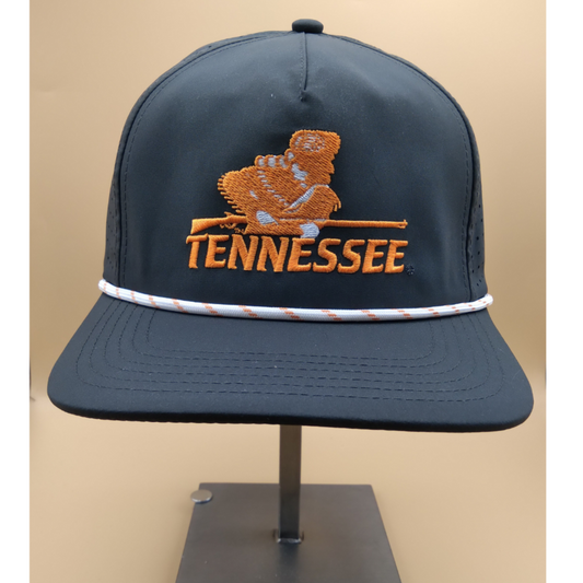Dark gray cap with orange 'Tennessee' text and bear logo on a beige background